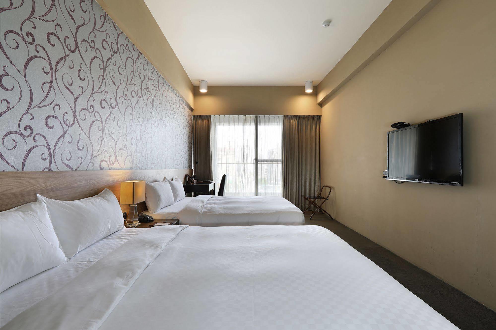 Kun Hotel Тайчжун Экстерьер фото